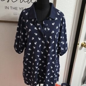 Woman Within Dark Blue Polo Shirt